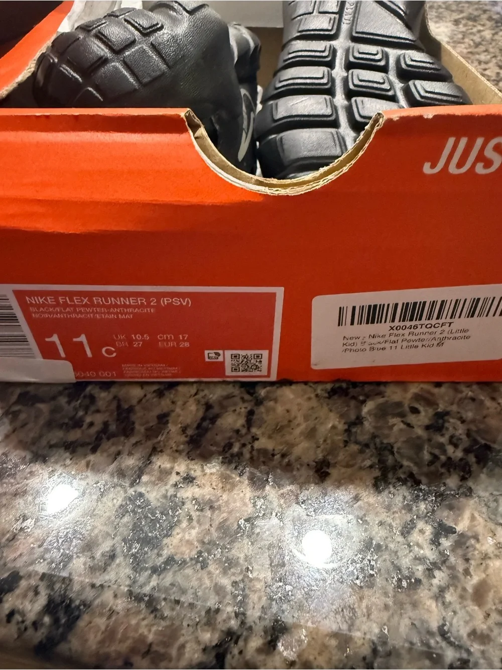 Nike Black Kids' Slip-On Sneakers with Silver Swoosh